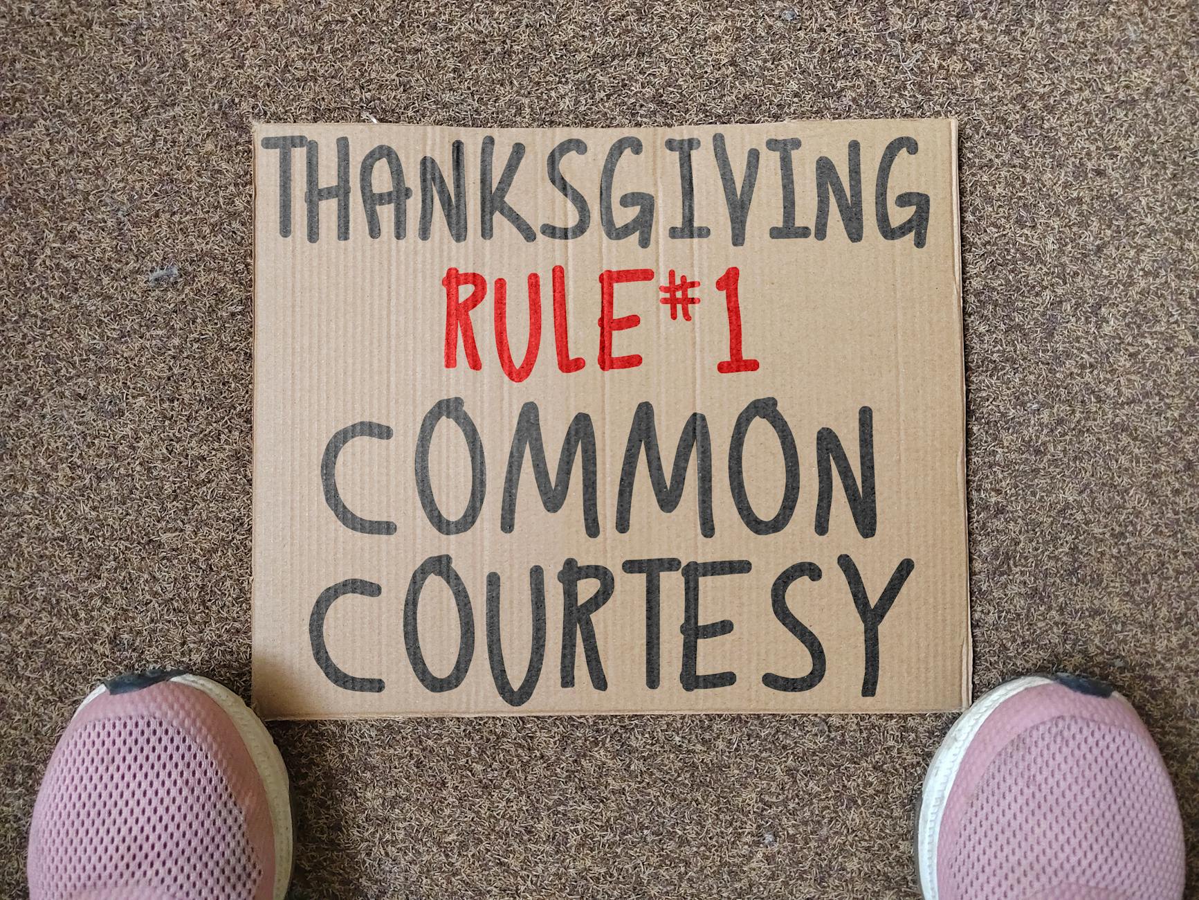 thanksgiving courtesy sign on carpeted floor